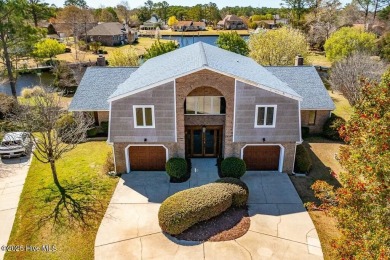 Experience unparalleled waterfront living in this extraordinary on Harbour Point Golf Club in North Carolina - for sale on GolfHomes.com, golf home, golf lot