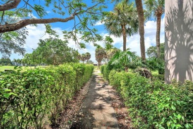 Welcome to this charming 55+ condo featuring tile flooring in on Wynmoor Golf Course in Florida - for sale on GolfHomes.com, golf home, golf lot