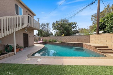 Discover warmth and comfort with this beautifully upgraded pool on Heartwell Golf Course in California - for sale on GolfHomes.com, golf home, golf lot