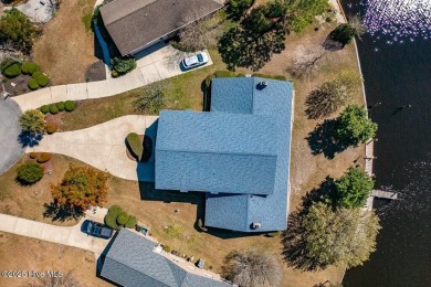 Experience unparalleled waterfront living in this extraordinary on Harbour Point Golf Club in North Carolina - for sale on GolfHomes.com, golf home, golf lot