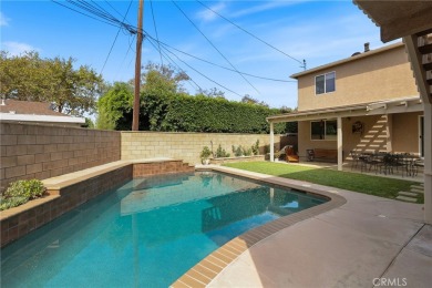 Discover warmth and comfort with this beautifully upgraded pool on Heartwell Golf Course in California - for sale on GolfHomes.com, golf home, golf lot