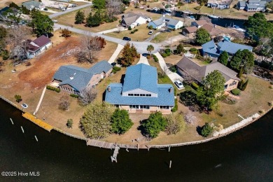 Experience unparalleled waterfront living in this extraordinary on Harbour Point Golf Club in North Carolina - for sale on GolfHomes.com, golf home, golf lot