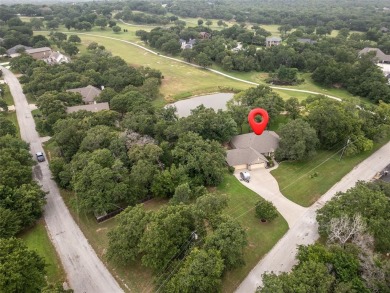 Stunning 3-bedroom, 2-bathroom, 4-car garage, home with new AC & on The Club At Runaway Bay in Texas - for sale on GolfHomes.com, golf home, golf lot