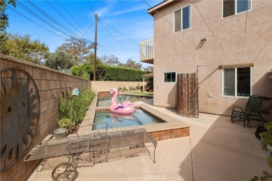 Discover warmth and comfort with this beautifully upgraded pool on Heartwell Golf Course in California - for sale on GolfHomes.com, golf home, golf lot