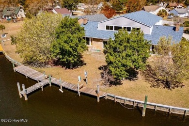 Experience unparalleled waterfront living in this extraordinary on Harbour Point Golf Club in North Carolina - for sale on GolfHomes.com, golf home, golf lot