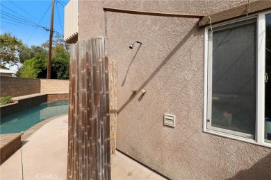 Discover warmth and comfort with this beautifully upgraded pool on Heartwell Golf Course in California - for sale on GolfHomes.com, golf home, golf lot