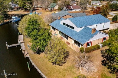Experience unparalleled waterfront living in this extraordinary on Harbour Point Golf Club in North Carolina - for sale on GolfHomes.com, golf home, golf lot