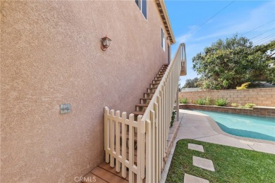 Discover warmth and comfort with this beautifully upgraded pool on Heartwell Golf Course in California - for sale on GolfHomes.com, golf home, golf lot