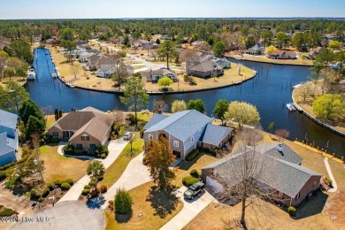 Experience unparalleled waterfront living in this extraordinary on Harbour Point Golf Club in North Carolina - for sale on GolfHomes.com, golf home, golf lot