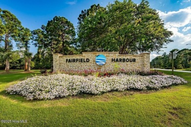 Experience unparalleled waterfront living in this extraordinary on Harbour Point Golf Club in North Carolina - for sale on GolfHomes.com, golf home, golf lot