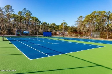 Experience unparalleled waterfront living in this extraordinary on Harbour Point Golf Club in North Carolina - for sale on GolfHomes.com, golf home, golf lot