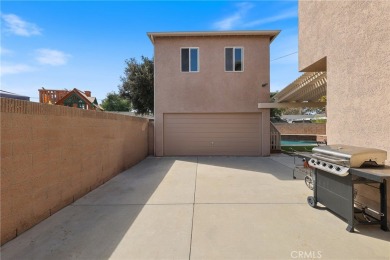 Discover warmth and comfort with this beautifully upgraded pool on Heartwell Golf Course in California - for sale on GolfHomes.com, golf home, golf lot