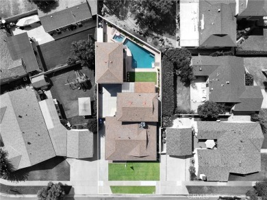 Discover warmth and comfort with this beautifully upgraded pool on Heartwell Golf Course in California - for sale on GolfHomes.com, golf home, golf lot