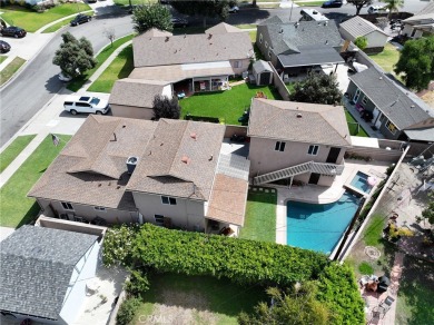 Discover warmth and comfort with this beautifully upgraded pool on Heartwell Golf Course in California - for sale on GolfHomes.com, golf home, golf lot