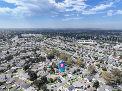 Discover warmth and comfort with this beautifully upgraded pool on Heartwell Golf Course in California - for sale on GolfHomes.com, golf home, golf lot