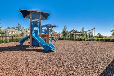 Step into a move-in-ready home where every detail is designed on Orange County National Golf Center and Lodge in Florida - for sale on GolfHomes.com, golf home, golf lot