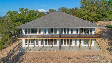 NEW BUILD, LAKE VIEWS, QUALITY CRAFTMANSHIP! Discover space on Seasons Ridge At Four Seasons in Missouri - for sale on GolfHomes.com, golf home, golf lot