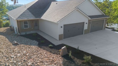 NEW BUILD, LAKE VIEWS, QUALITY CRAFTMANSHIP! Discover space on Seasons Ridge At Four Seasons in Missouri - for sale on GolfHomes.com, golf home, golf lot