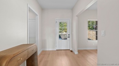 NEW BUILD, LAKE VIEWS, QUALITY CRAFTMANSHIP! Discover space on Seasons Ridge At Four Seasons in Missouri - for sale on GolfHomes.com, golf home, golf lot
