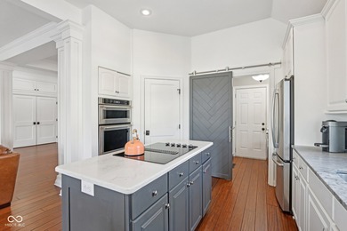 Welcome to your dream home in the heart of Fishers, nestled on River Glen Country Club in Indiana - for sale on GolfHomes.com, golf home, golf lot