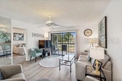 Located in East Lake Woodlands this quiet private second-story on East Lake Woodlands Country Club in Florida - for sale on GolfHomes.com, golf home, golf lot