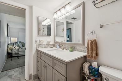 Located in East Lake Woodlands this quiet private second-story on East Lake Woodlands Country Club in Florida - for sale on GolfHomes.com, golf home, golf lot