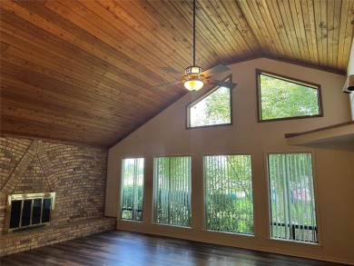 Great curb appeal on this 3BD-3BA Golf Course Home at Holly Lake on Holly Lake Ranch Golf Club in Texas - for sale on GolfHomes.com, golf home, golf lot