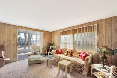This 1978 home on a premium interior lot is ready for your on Maple Leaf Golf and Country Club in Florida - for sale on GolfHomes.com, golf home, golf lot