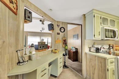 This 1978 home on a premium interior lot is ready for your on Maple Leaf Golf and Country Club in Florida - for sale on GolfHomes.com, golf home, golf lot