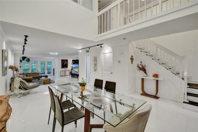 Live in the heart of a country club oasis without the country on Turnberry Isle Resort and Club in Florida - for sale on GolfHomes.com, golf home, golf lot