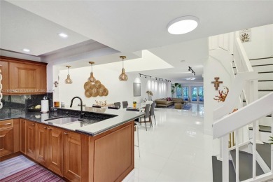 Live in the heart of a country club oasis without the country on Turnberry Isle Resort and Club in Florida - for sale on GolfHomes.com, golf home, golf lot