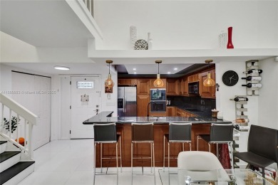 Live in the heart of a country club oasis without the country on Turnberry Isle Resort and Club in Florida - for sale on GolfHomes.com, golf home, golf lot