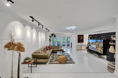 Live in the heart of a country club oasis without the country on Turnberry Isle Resort and Club in Florida - for sale on GolfHomes.com, golf home, golf lot