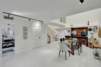Live in the heart of a country club oasis without the country on Turnberry Isle Resort and Club in Florida - for sale on GolfHomes.com, golf home, golf lot