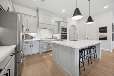 Discover luxury living in this stunning 3-bedroom, 2.5-bath home on The Tribute At the Colony in Texas - for sale on GolfHomes.com, golf home, golf lot