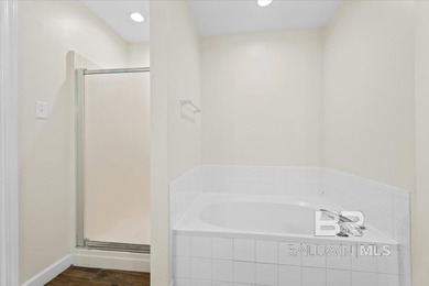 Step into this spacious 5-bedroom, 2.5-bath home where a on Lake Forest Yacht and Country Club in Alabama - for sale on GolfHomes.com, golf home, golf lot