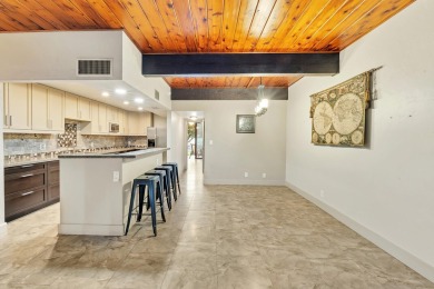 Spacious and updated villa-style condo, 2-story 2-bedroom 2-bath on Jacaranda Golf Club in Florida - for sale on GolfHomes.com, golf home, golf lot