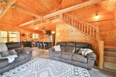 Enjoy relaxing on the large 10x30 deck overlooking the 11th hole on Hardwoods Golf Club At Mille Lacs in Minnesota - for sale on GolfHomes.com, golf home, golf lot