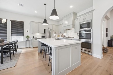 Discover luxury living in this stunning 3-bedroom, 2.5-bath home on The Tribute At the Colony in Texas - for sale on GolfHomes.com, golf home, golf lot