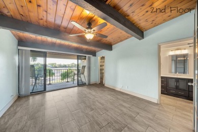 Spacious and updated villa-style condo, 2-story 2-bedroom 2-bath on Jacaranda Golf Club in Florida - for sale on GolfHomes.com, golf home, golf lot