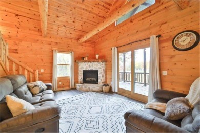 Enjoy relaxing on the large 10x30 deck overlooking the 11th hole on Hardwoods Golf Club At Mille Lacs in Minnesota - for sale on GolfHomes.com, golf home, golf lot