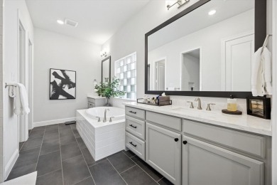 Discover luxury living in this stunning 3-bedroom, 2.5-bath home on The Tribute At the Colony in Texas - for sale on GolfHomes.com, golf home, golf lot