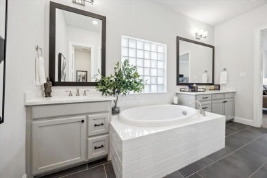 Discover luxury living in this stunning 3-bedroom, 2.5-bath home on The Tribute At the Colony in Texas - for sale on GolfHomes.com, golf home, golf lot