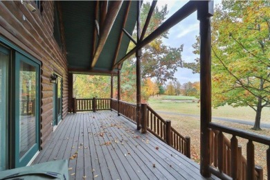 Enjoy relaxing on the large 10x30 deck overlooking the 11th hole on Hardwoods Golf Club At Mille Lacs in Minnesota - for sale on GolfHomes.com, golf home, golf lot