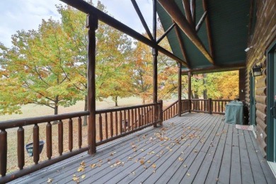 Enjoy relaxing on the large 10x30 deck overlooking the 11th hole on Hardwoods Golf Club At Mille Lacs in Minnesota - for sale on GolfHomes.com, golf home, golf lot