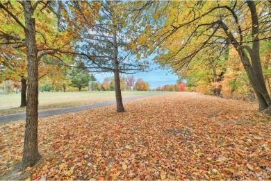 Enjoy relaxing on the large 10x30 deck overlooking the 11th hole on Hardwoods Golf Club At Mille Lacs in Minnesota - for sale on GolfHomes.com, golf home, golf lot