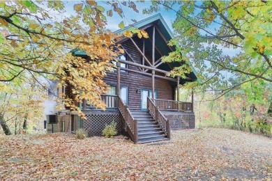 Enjoy relaxing on the large 10x30 deck overlooking the 11th hole on Hardwoods Golf Club At Mille Lacs in Minnesota - for sale on GolfHomes.com, golf home, golf lot