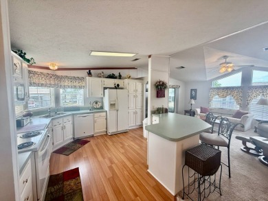 Home is located in Water Oak Country Club Estates in Lady Lake on Water Oak Country Club Estates in Florida - for sale on GolfHomes.com, golf home, golf lot
