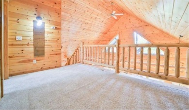 Enjoy relaxing on the large 10x30 deck overlooking the 11th hole on Hardwoods Golf Club At Mille Lacs in Minnesota - for sale on GolfHomes.com, golf home, golf lot