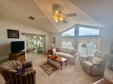 Home is located in Water Oak Country Club Estates in Lady Lake on Water Oak Country Club Estates in Florida - for sale on GolfHomes.com, golf home, golf lot
